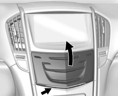 In a crash, these objects may cause the cover to open and could result in injury. Instrument Panel Storage To access, press on the cover and release. There is an accessory power outlet inside.