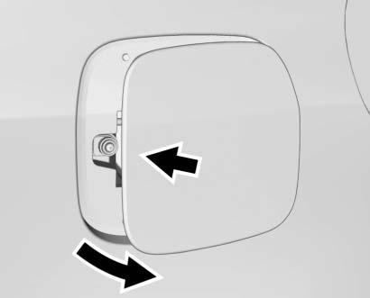 If equipped, the fuel door is locked when the vehicle doors are locked. Press K on the RKE transmitter to unlock. To open the fuel door, push and release the rearward center edge of the door.