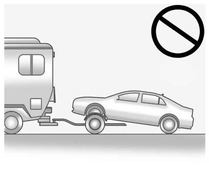 vehicle must be towed, a trailer should be used. See the information on dolly towing. Dolly Towing (Rear-Wheel-Drive Vehicles) To dolly tow a rear-wheel-drive vehicle from the rear: 1.