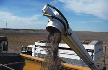 A patented 10 inch x 17 ft 409 stainless steel, single piece swing-away auger offers up to 4000 pounds per minute unloading capacity with individual hydraulic auger controls.