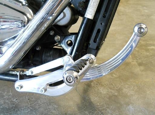Connect the Brake Pedal to the outside of the FC6-R with a 3/8-16x2 Button Head Bolt and secure with a 3/8 nut. Install a foot peg into the top hole of the FC6-R and tighten.