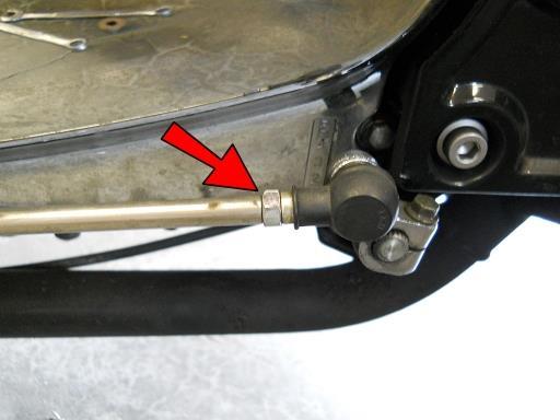 On the shifter side, remove the stock foot control mount by removing the two bolts that attach it to the frame as done previously on the other side.