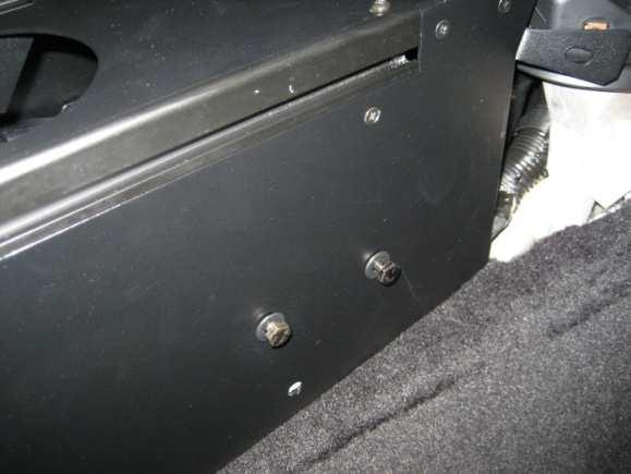 holder Attach driver side trim panel to console housing with # 8 x .