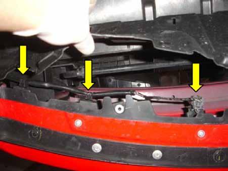 5. You will also need to disconnect the ambient air temp sensor and the 2 plastic clips that secure the wire harness to the bumper. 6.