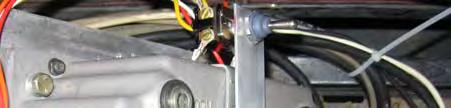 5.) Remove the red wire with yellow stripe from the tow switch and install one end of the black wire
