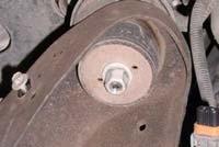 a. Loosen but do not remove, core support bolt and three cab bolts from drivers side cab. Core Support Bolt with Nut Cab Bolts b.