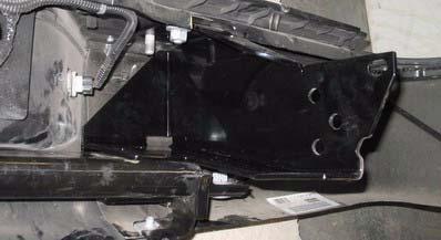 Mark eight holes through two kit brackets (bumper, rear) onto bumper support.