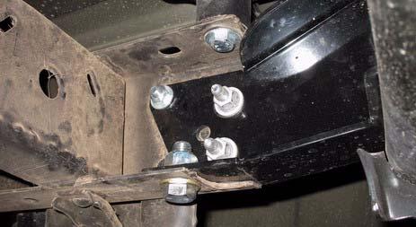 Install bumper support onto two kit brackets (bumper, rear) with four kit bolts (1/2-13 x 3 ), eight kit washers (1/2 SAE) and four kit nuts (1/2-13 Stover). DO NOT TIGHTEN.