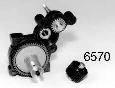 gears. Fig. 60 Figs. 61 & 62 Open bag E and remove the #6572 3/8" long roll pin.
