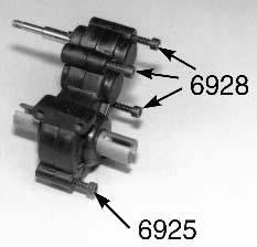 Now you are going to fasten the motor guard to the motor plate with the #6288 screws. The motor guard fits over the mounting points on the motor plate. See fig. 71. Figs.