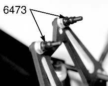 (2) Screw the 3/4" SHCScrews into the top outside hole of the rear fiberglass shock strut, from the back (transmission) side as shown in fig. 132.