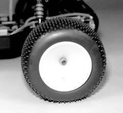 Fig. 206 Fig. 207 Ball bearing kit wheel shown Figs. 207, 208 & 209 For Ball Bearing kits remove the front tire and wheel bag from the kit box.