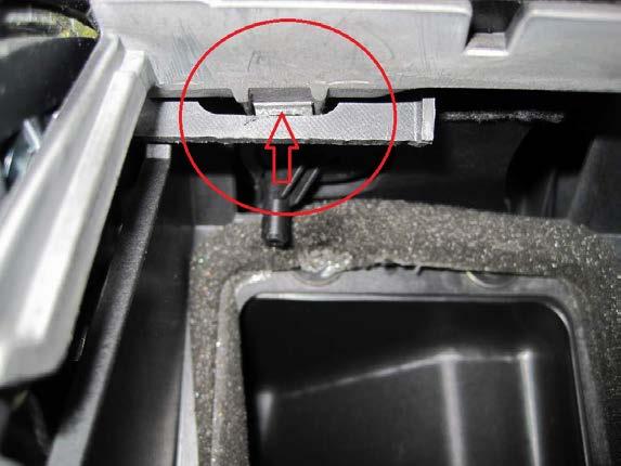 When you removed the bolts, detach the clip which is located at the left upper side.