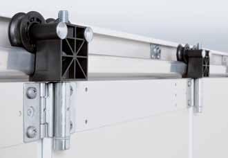 Precise door travel Twin rollers [ 1 ] made of wear-resistant plastic move reliably and precisely on the aluminium rail and prevent the door sections from jumping out.
