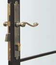 Features a decorative lever handle and escutcheon plate on both