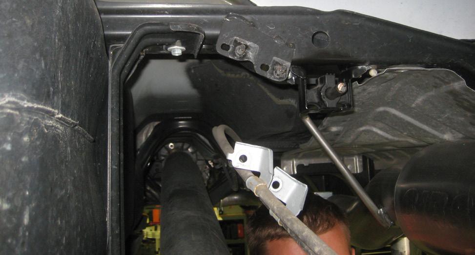 On both sides of the vehicle, remove the OE swaybar frame bracket completely and save the hardware. 35. Working on the passenger side, Loosen, but do not remove the U-bolt hardware. 36.
