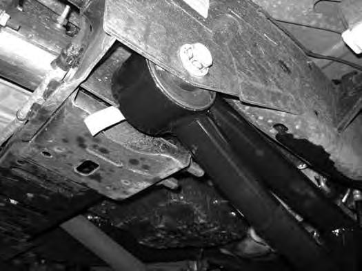 Do not tighten the pivot bushing hardware at the frame at this time. BUMP STOP INSTALLATION: 18.