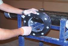 Assembly of Taper/Taper Flanges Prepare the cut pipe end by shaving the appropriate spigot.