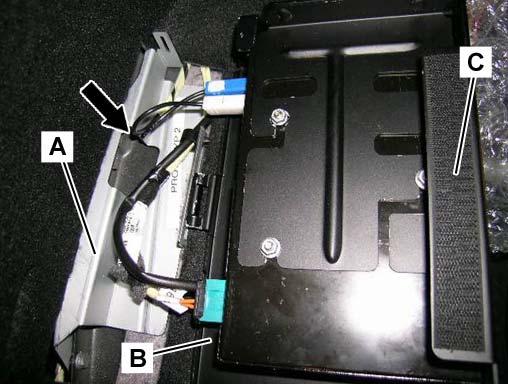 Figure 20). Route the SDARS antenna cable under the trunk cover (Arrow, Figure 20). Note: Be careful not to pinch any wires when installing the bracket assembly. 4.