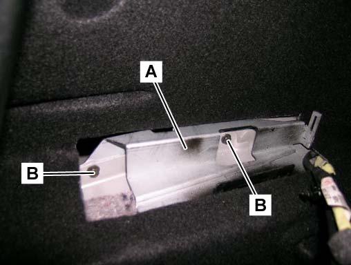 Mount the part A of the SDARS bracket (A, Figure 9 and A, Figure 10) over the body paneling with the two provided screws