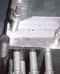 The last (aft) rivet in the outboard rivet line.