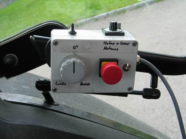 An additional remote control makes it possible to steer manually by rotary control (steering by wire) and to correct the tractor position (deviation to right/left). (Fig. 5) Fig 5: Remote Control Fig.