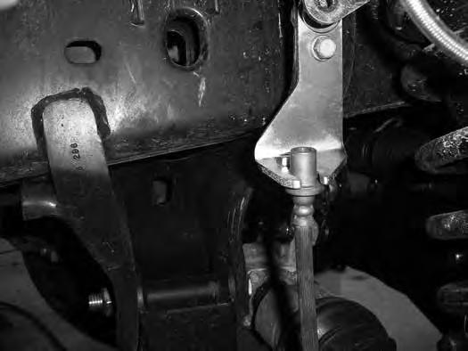 15. 4 kit only: Attach the provided brake line relocation bracket to the frame where the original line mounted. The brakeline bracket will offset towards the rear of the vehicle.