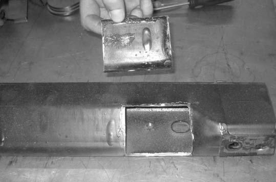 10. Using a die grinder, carefully notch out the OE cross