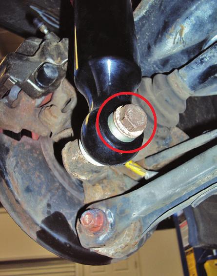 tighten into the lower air spring end cap