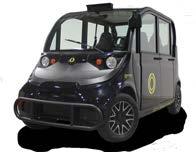 The autonomous minibus is equipped with modern safety features, including buttons to stop the ride 