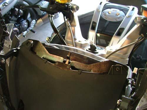 The screw holes in front fairing may need to be slightly elongated with an Exacto