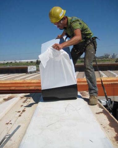 13. For rail installation, secure the solar panel wire harness to the rooftop as needed very six inches using adhesive tie-wrap mount (item 11) and wire tie (item 12).