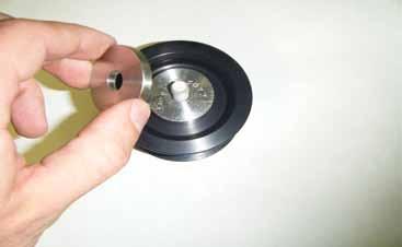 Then, install the guided tensioner pulley and tensioner pulley base (PN: XX09737-0077) onto the