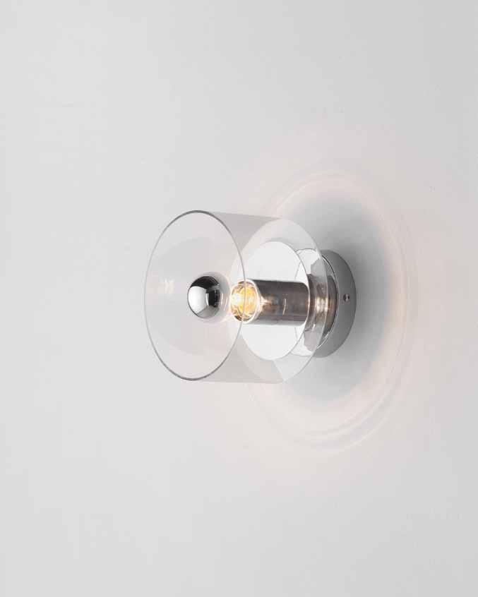 G9 lampholder, 33W bulb included. Ø178 112 175 Ø117 Aplique de cristal transparente, montado sobre una base metálica. Bombilla no incluida.