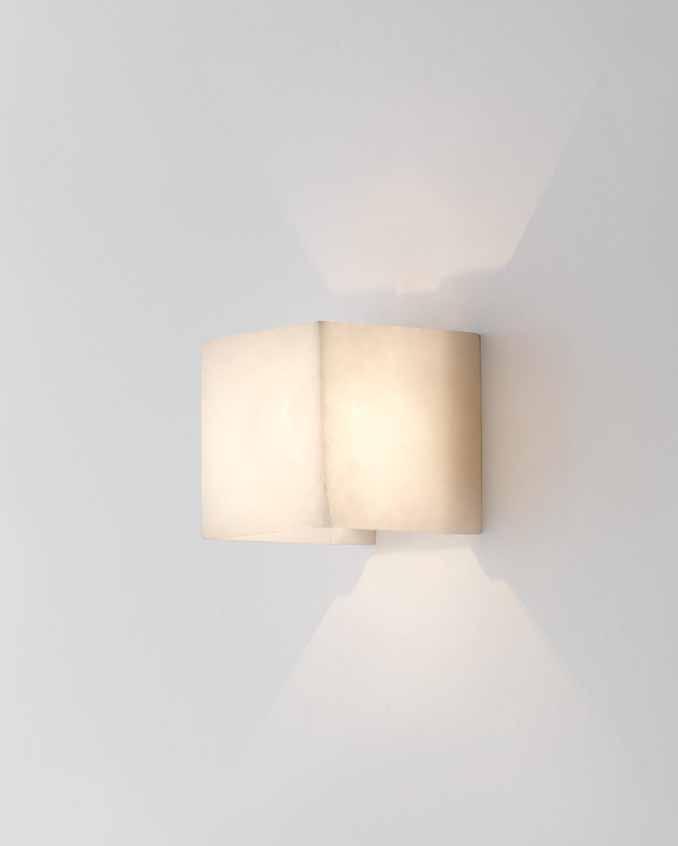 Blanco Negro Wall lamp with metalic disc in diferent finish can also be changed for alabaster disc in two sizes. Bulb not included. Finish Disc sizes Gold Ø 25 cm.