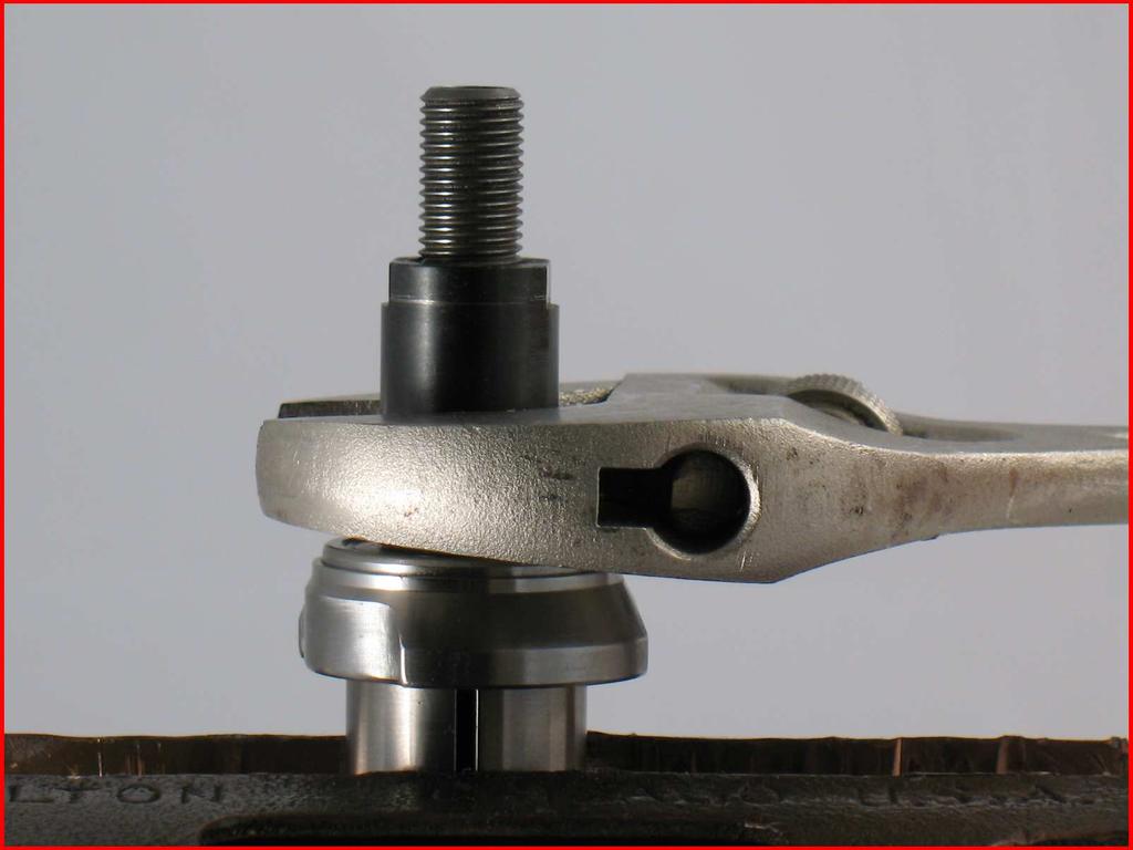 6. Fasten the 01120 Rotor in the vise with aluminum or bronze jaws and