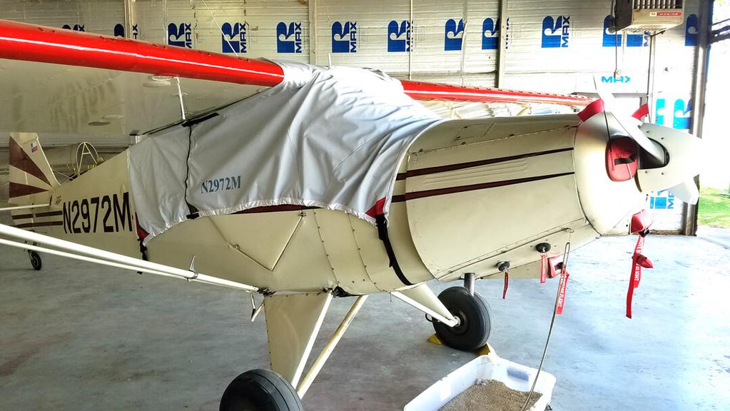 incorporates dense closed cell foam into the entire upper surface of the wing covers to help prevent hail damage.