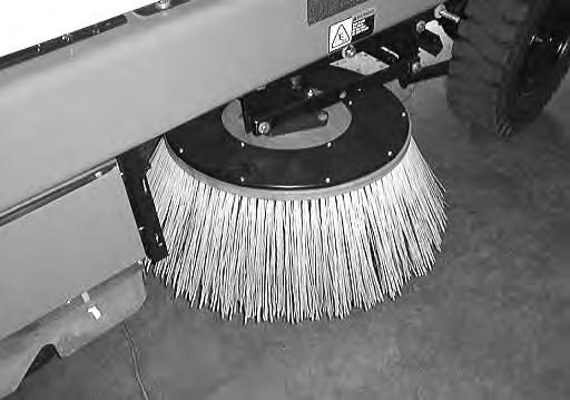 MAINTENANCE SIDE BRUSH The side brush sweeps debris along edges into the path of the main brush. Check the brush daily for wear or damage.