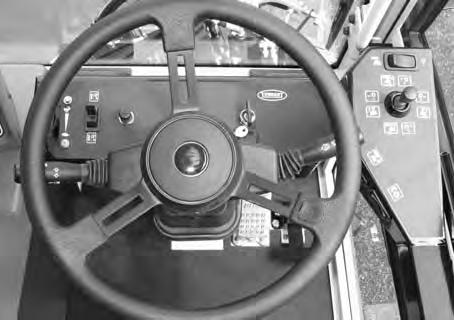 OPERATION STEERING WHEEL The steering wheel controls the machine s direction. The machine is very responsive to the steering wheel movements.