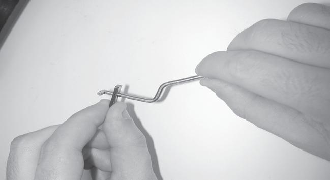 body. 5. Insert the small end of the choke rod (Fig.