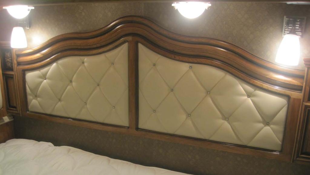 Decorated bedroom with master suite headboard