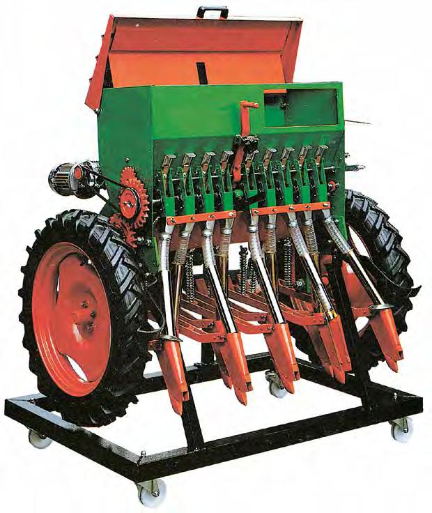 VB 8610 VB 8610E 9-ROW MECHANICAL SEEDER (on stand with wheels) - electrical A-62 Accurate section of a towed universal seeder showing: Seed hopper Distributor Inlet pipes Coulter The engine operates
