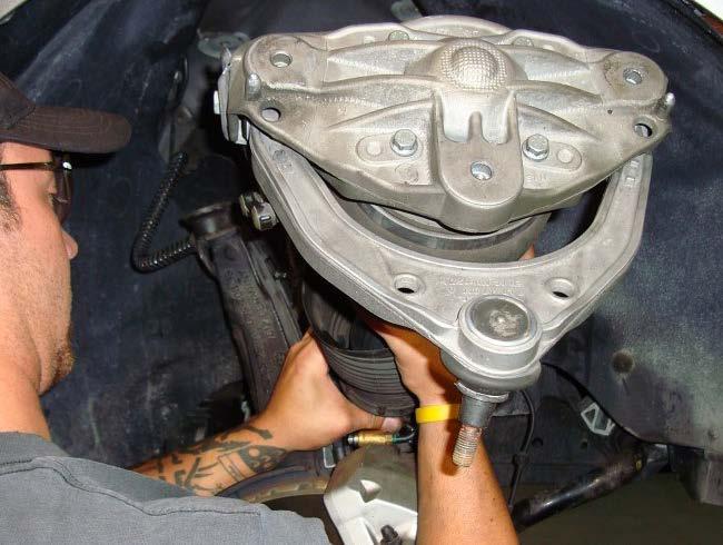 10. REMOVE STRUT ASSEMBLY FROM THE VEHICLE.