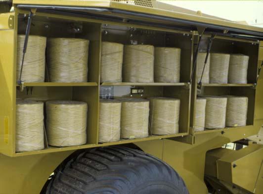 The twine boxes hold sufficient twine for a full days running, and are placed on each side of the baler