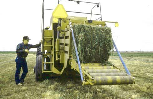 A roller bale chute is recommended when using the bale ejector, as it allows the bale to slide to the ground after ejection.