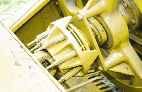 Main Drive Slip clutch The driveline is protected from damage by a slip clutch. The adjustable slip clutch reduces shock loads to the tractor PTO clutch by slipping slightly every plunger stroke.