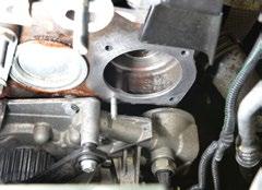 Installation camshaft belt: 1. Change tensioning pulley and, if necessary, water pump. Thoroughly clean and degrease contact face between water pump and engine (Fig. 7).