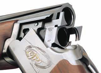 This gun is attractive with a modern, sporty engraving which includes a silver and gold design.