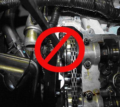 Apply force to move the camshaft forward (towards the camshaft phasers). Read the dial indicator. This is the end play of the camshaft shaft.