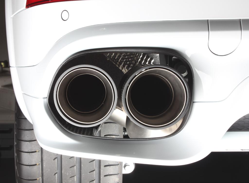11. Slide the outer tail-pipes onto the muffler outlets.